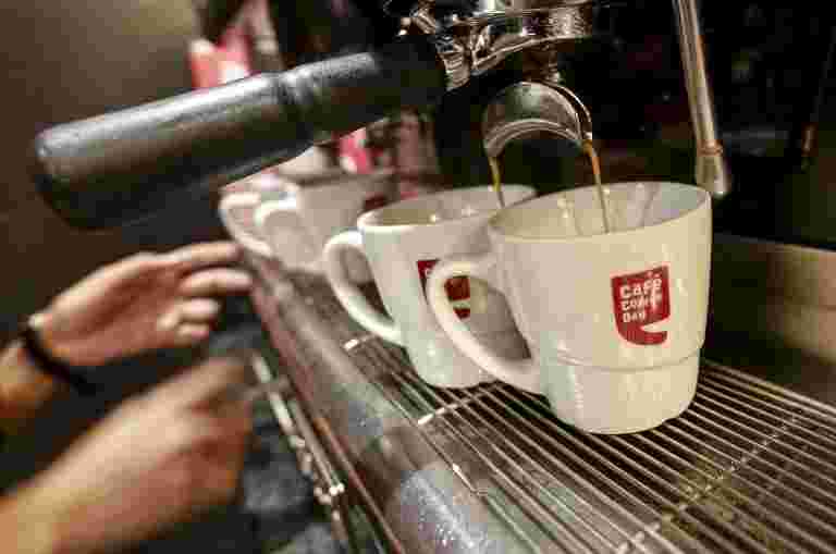 咖啡日集团的杰出债务在4,970亿卢比，寻求更多的时间偿还
